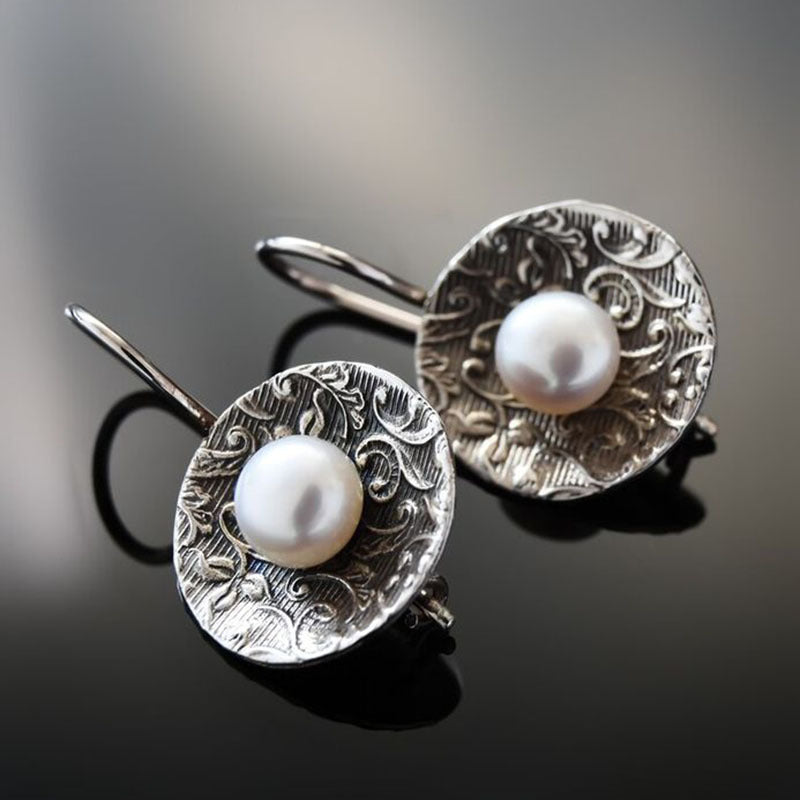 Round White Gold Inlaid Red Diamond Earrings