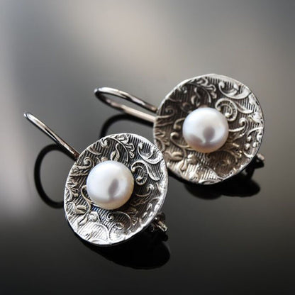 Round White Gold Inlaid Red Diamond Earrings