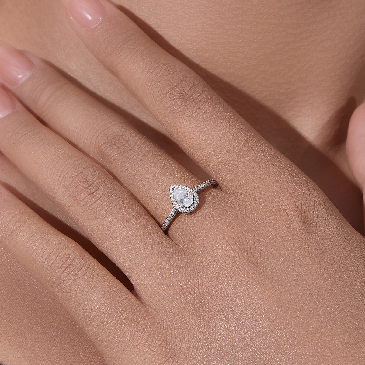 Sterling Silver Three-claw Water Drop Moissanite Ring